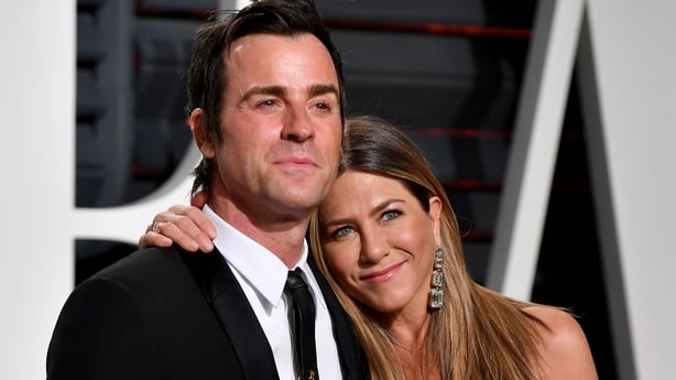 US actor Justin Theroux, left and his wife US actress Jennifer