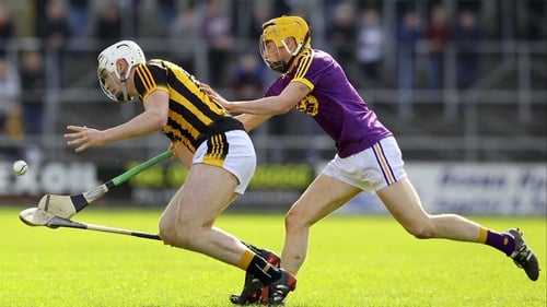 Liam Blanchfield of Kilkenny is challenged by Wexford's Liam Ryan