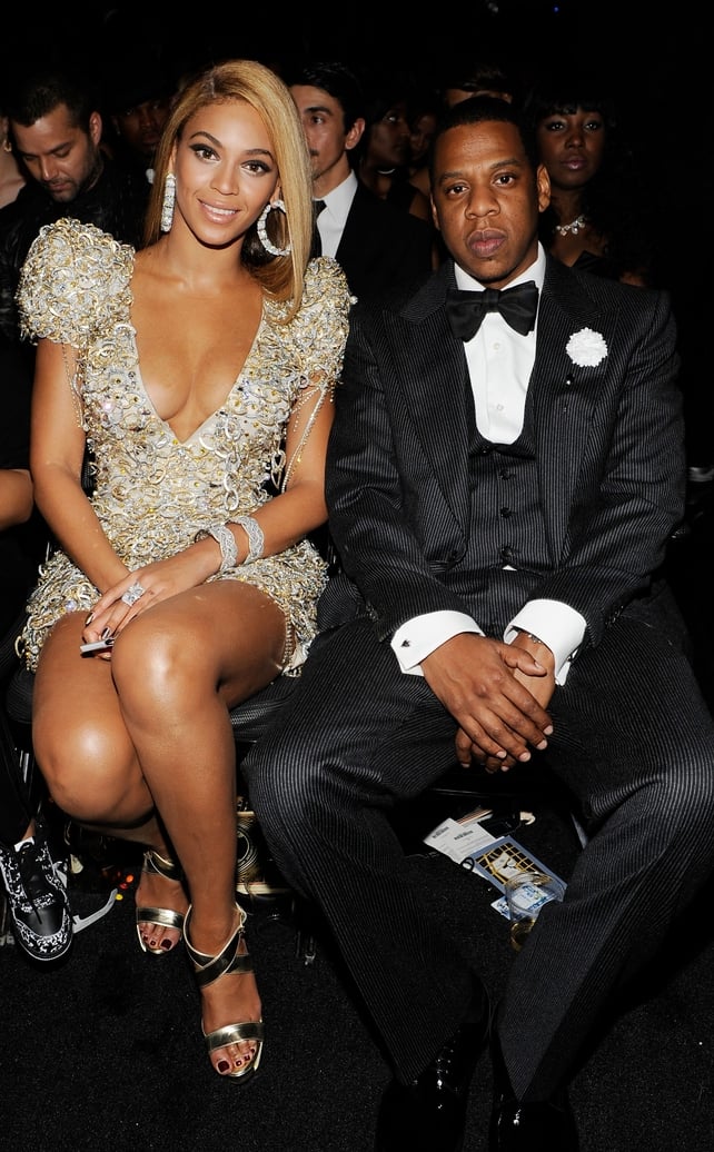 Beyoncé made history at the 2010 Grammys by becoming the most awarded woman in one night. Ever. Here she is wearing a Giorgio Armani Privé chain metal dress with Swarovski crystals.