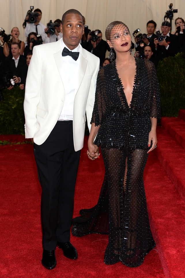 Beyoncé wore a sheer black Givenchy dress while Jay donned a snazzy white number to the 'Charles James Beyond Fashion' Met Gala in 2014.