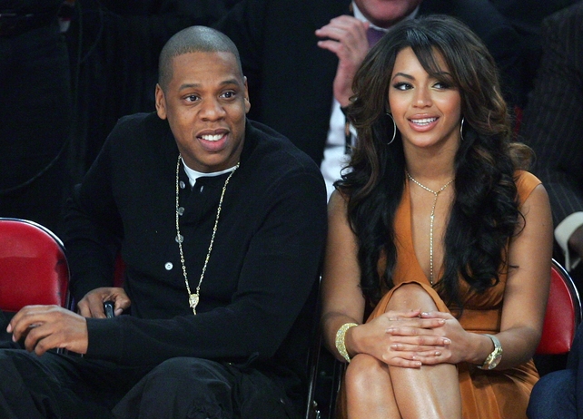Beyoncé rocks some darker locks with Jay-Z at the NBA All-Star Game in 2007.
