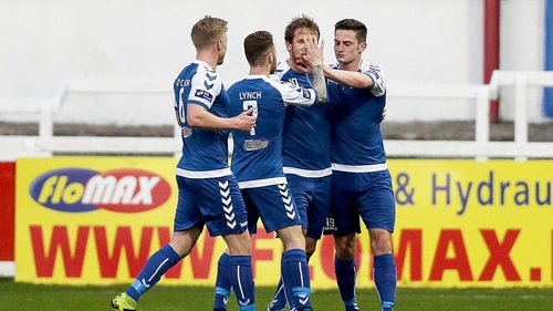 Tony Whitehead gets the congratulations from his team-mates after scoring Limerick's opener