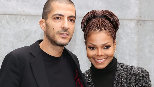 Wissam al Mana and Janet Jackson attend the Giorgio Armani fashion show during Milan Fashion Week in 2013