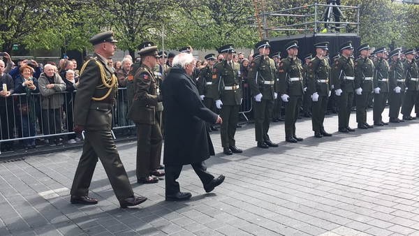 President Michael D Higgins inspects an honour guard