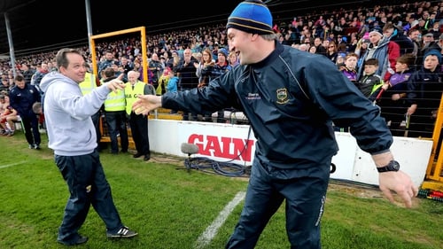 Davy Fitzgerald (L) and Michael Ryan shake hands after Tipp's defeat of Wexford