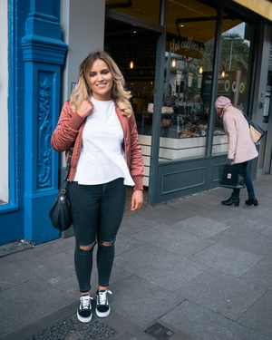 A classic glam day time look - crisp white top, bomber jacket and black suede Vans.