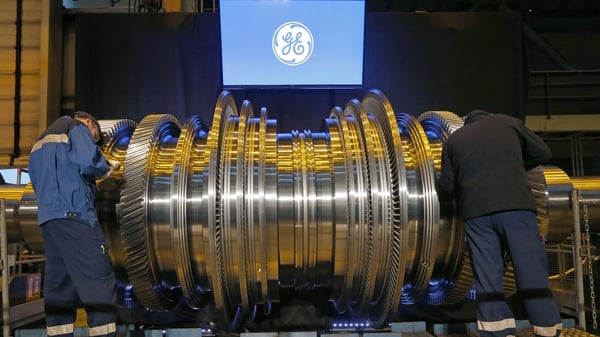 GE's quarterly revenue fell to $27.66 billion from $27.85 billion