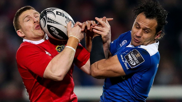 Munster's Andrew Conway and Isa Nacewa of Leinster battle for possesion in the sides' December meeting