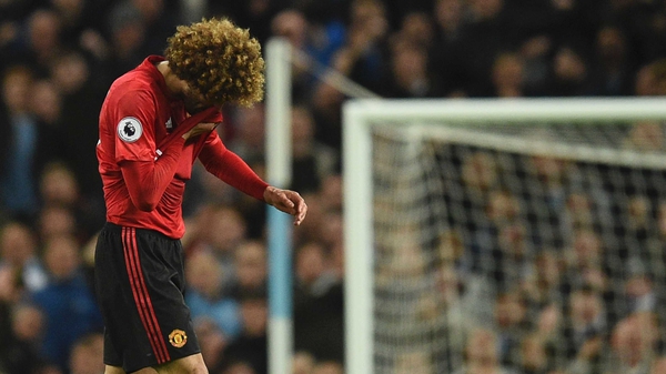 Marouane Fellaini heads for an early bath in the Manchester Derby on Thursday night