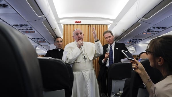 Pope Francis talks to journalists during a press conference he held on his return flight from Cairo to Rome