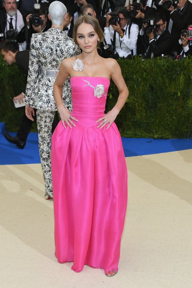 Lily-Rose Depp is a beautiful rose in this Chanel bustier dress with floral details.