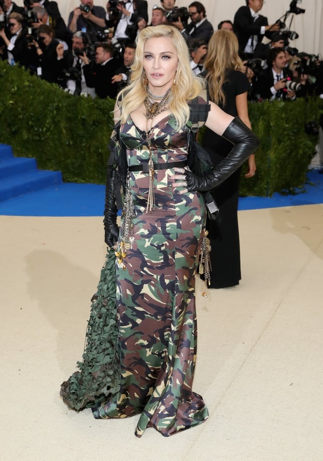 The one and only Madonna always knows how to make a splash on the red carpet! The singer/soldier wore a Moschino camo gown.