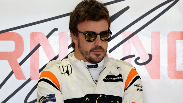 Fernando Alonso has signed a new McLaren deal