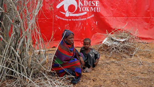 A woman and child at a camp for displaced people in the Kaxda district, on the outskirts of Mogadishu