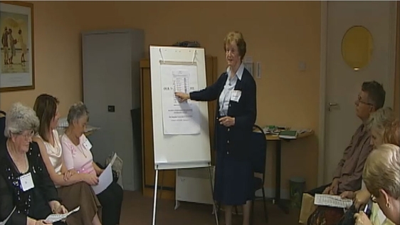 Sr Bernadette MacMahon gives a class on how to fill out an electoral ballot paper at St Helena's Family Resource Centre, Finglas (2007).