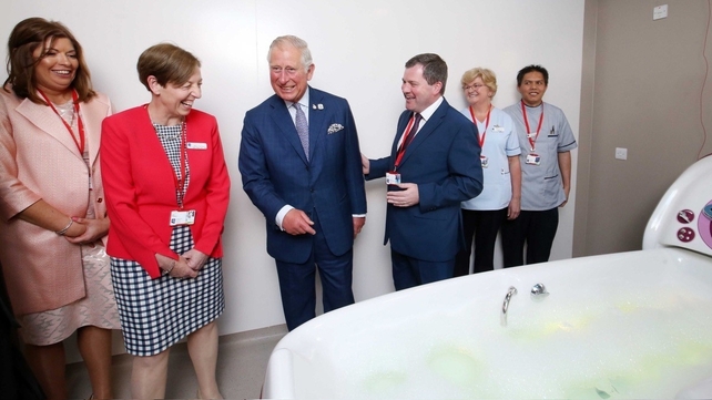 Charles talks to staff at Our Lady's Hospice Harold's Cross