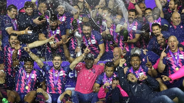 Stade Francais celebrate their challenge cup win over Gloucester