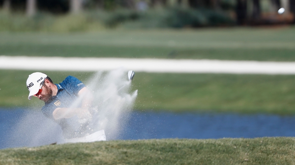 Oosthuizen shoots out of a bunker on the sixth at TPC Sawgrass