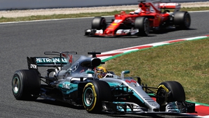Hamilton succeeded in fending off the challenge of Vettel's Ferrari