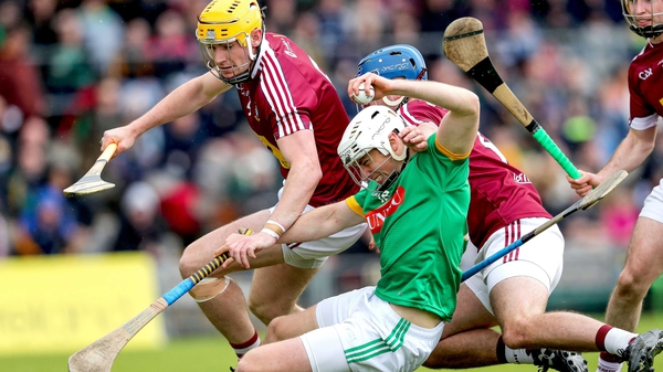 Westmeath's Aaron Craig and Tommy Gallagher tangles with Gavin McGowan