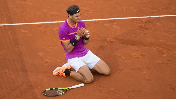 Nadal sinks to his knees after completing his straight sets win
