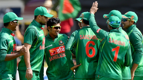Bangladesh celebrate taking the wicket of William Porterfield