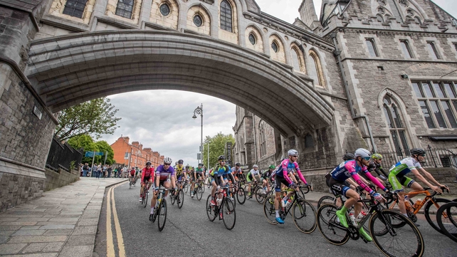 Riders pass through Christchurch Cathedral...