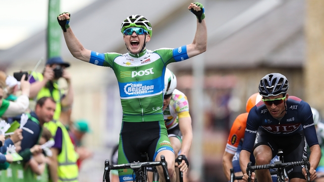Matthew Teggart raises is hands in jubilation