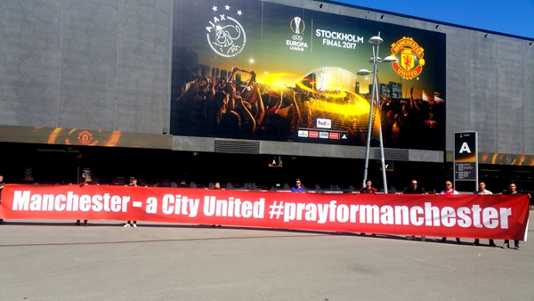 Manchester United fans unveil a banner in Stockholm. Pic: Stretford End Flags on Twitter @SEF_MUFC