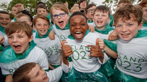 Children cheer their way towards World Rugby's HQ in Dublin