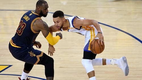 LeBron James in action against Stephen Curry