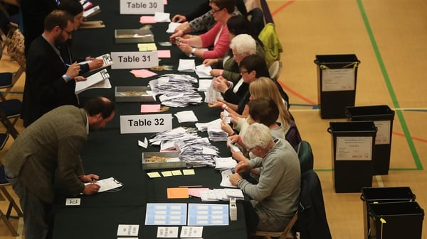 Election staff count ballot papers in Kendal, Cumbria, England