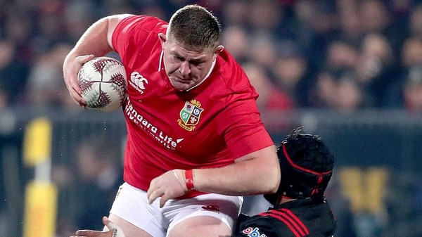 Tadhg Furlong crashes though a tackle from Jordan Taufua of the Crusaders
