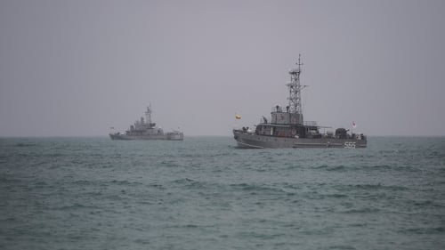 Myanmar navy ships battled high winds as the search for the wreckage of the military plane continued