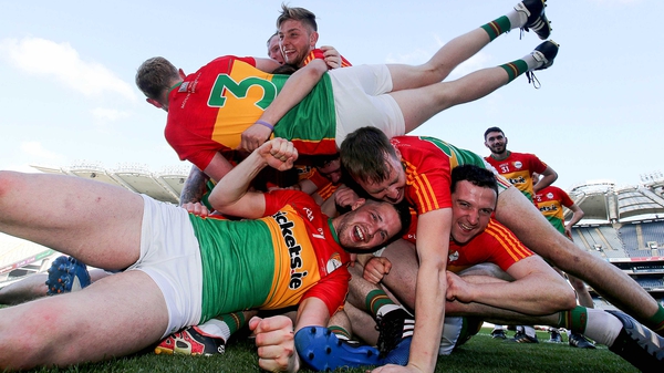 Elated Carlow players celebrate their triumph
