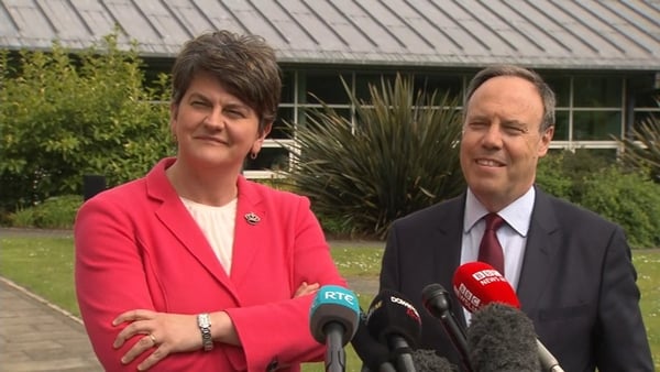 DUP leader Arlene Foster and DUP MP Nigel Dodds talk to the media