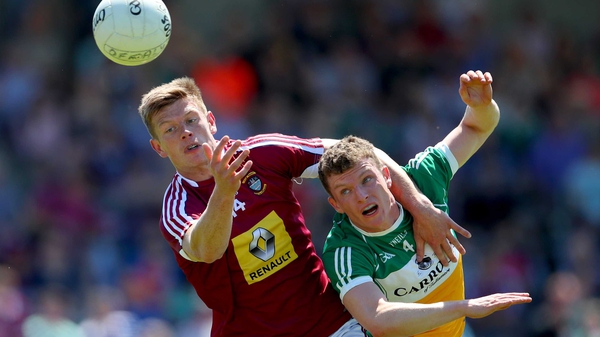 Westmeath's John Heslin battles with Sean Pender of Offaly