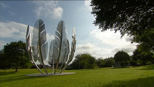 The sculpture shows nine stainless steel eagle feathers reaching seven metres towards the sky, to represent a bowl of food for the hungry