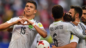 Mexico's defender Hector Moreno (L) celebrates his leveller