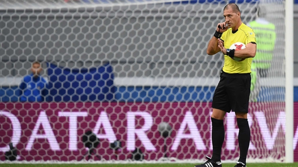 Argentina's referee Nestor Pitana gestures during the clash between Portugal and Mexico