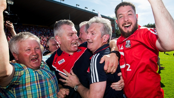 Cork boss Kingston celebrates with assistant Diarmuid O'Sullivan and the Rebel faithful