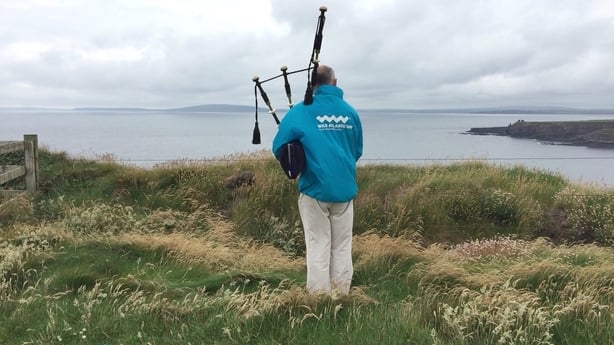 Piper and tour guide Danny Houlihan at the Bromore Cliffs