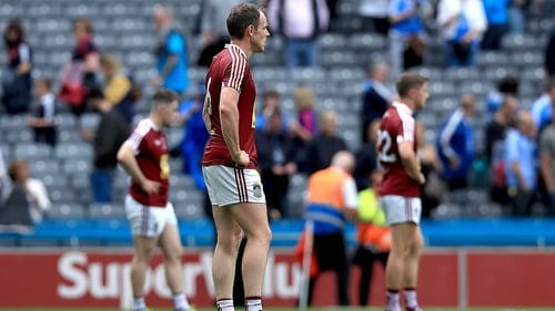 Westmeath players stand dejected at the final whistle