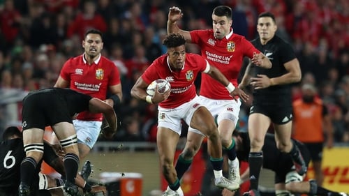 Anthony Watson of the Lions breaks with the ball