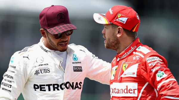Hamilton (L) and Vettel are at odds over what happened in Azerbaijan