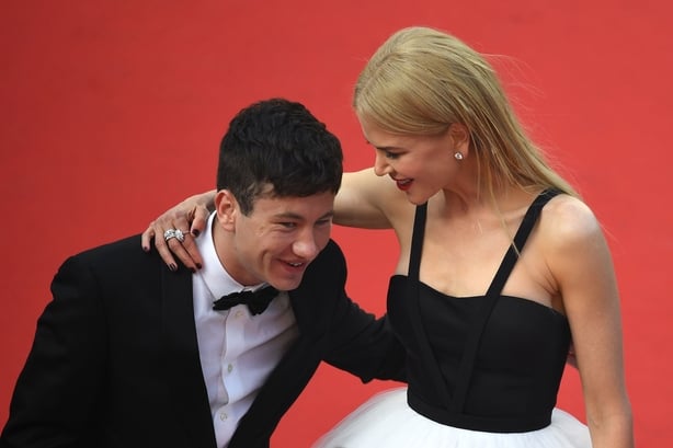 Barry Keoghan (L) and Australian actress Nicole Kidman pose as they arrive on May 22, 2017 for the screening of the film 'The Killing of a Sacred Deer' at the 70th edition of the Cannes Film Festival