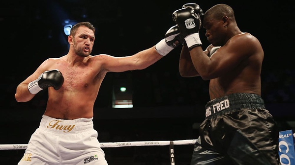 Hughie Fury (L) in action against Fred Kassi