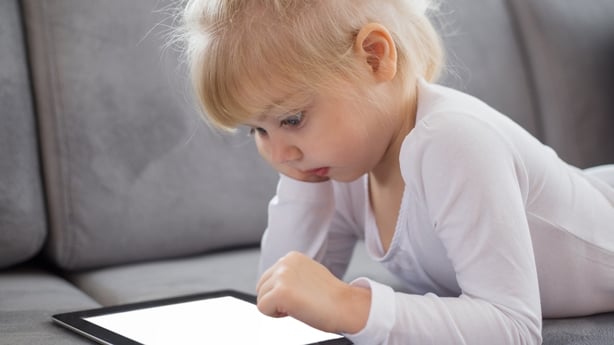 child on tablet