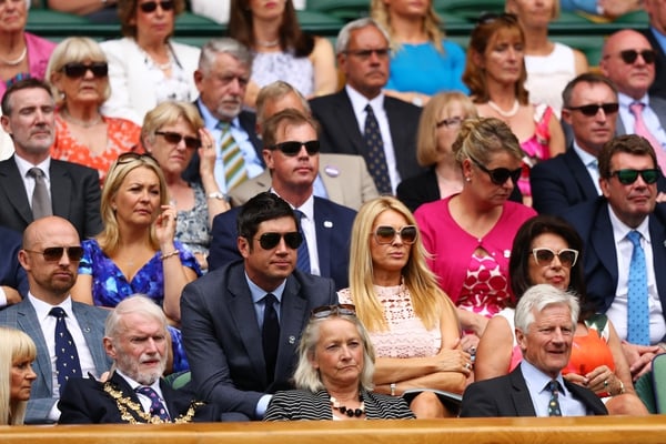 Matt Dawson, Vernon Kay and Tess Daly look on from the royal box. Tess is wearing a pink lace dress, similar to Pippa Middleton, from French label Sandro.