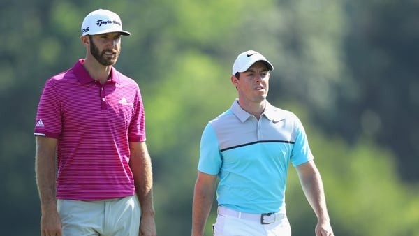 Rory McIlroy (R) and Dustin Johnson